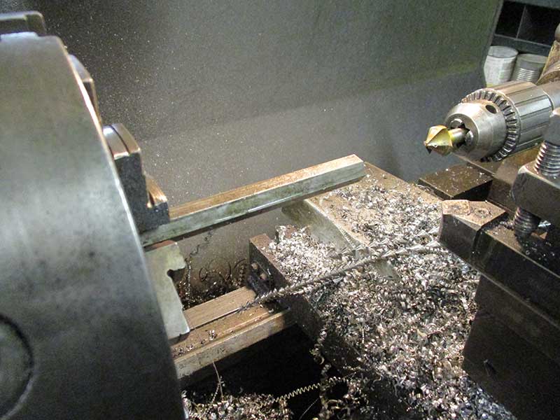 The hex metal bar in the lathe